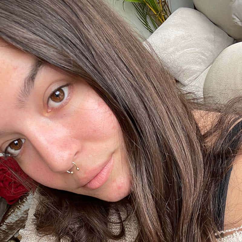 Woman with face off camera