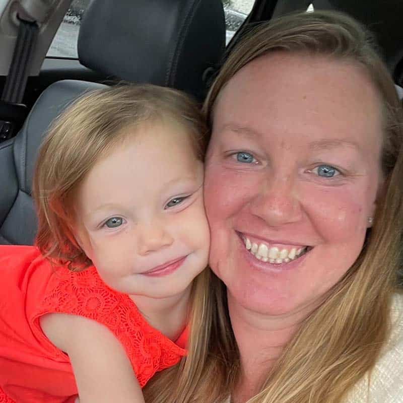 Mother and child with faces together